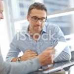 stock-photo-25942887-going-through-valuable-corporate-research